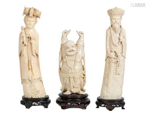 China, early 20th centuryEmperor and Empress in carved ivory, the dresses decorated with dragonsA Buddha is attached with arms raised in carved ivoryH: 25 and 18 cm (excluding wooden base)(small accidents)