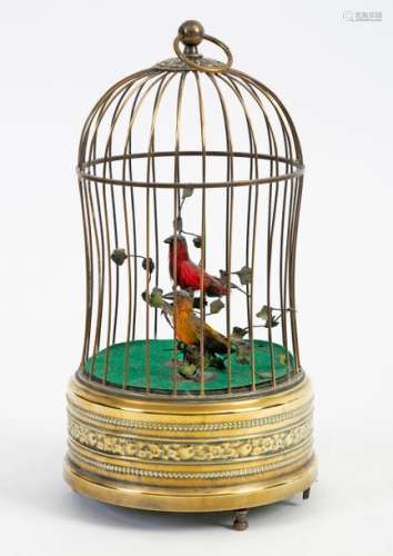 Copper birdcage containing two coloured feathered whistling birdsAttributed to the house BontemsFrench work, late 19th-early 20th H. total: +/- 30 cm In working order