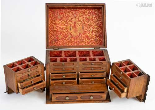 Walnut apothecary case for apothecary's kit, opening by two leaves and the lid which hides 22 small compartments for bottles and 9 small drawers. Wroughtiron frame 18th Century 28,5 x 21 x 21,5 cm (accidents, missing glassware)