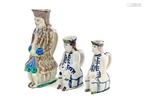 Set of three Jacquot jugs in polychrome earthenware from Brussels or LilleLate 18th-early 19th centuryH: from 19 to 30.5 cm(accidents)