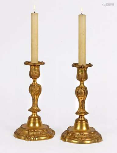 Pair of Louis XV style candlesticks in chased and gilded bronze Frenchprovincial work 18th centuryH period: 25 cmProvenance: Galerie Olivier et Régine Theunissen, BrusselsEnclosed is a sales document dated July 28th 2003
