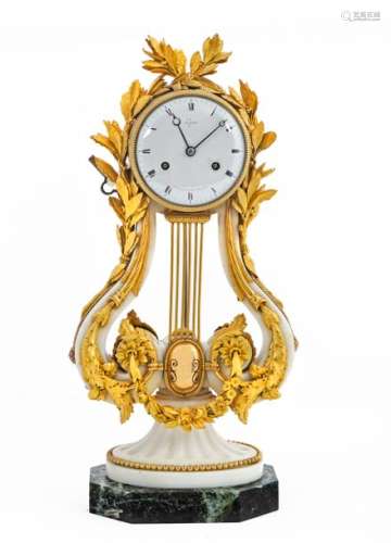 Lyre clock in white marble and chased and gilded bronze richly decorated with acanthus leaves, garlands of flowers and laurelbranches Enamelled dial with Roman numerals, signed 