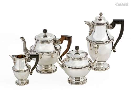 Louis XVI style coffee and tea set in silver 950/1000 including coffee pot, teapot, sugar bowl and milk jug Woodenhandles and frets Hallmark of Altenloh in Brussels, Goldsmiths of LL.MM the King and Queen Totalweight: +/- 2150 grs(accidents)