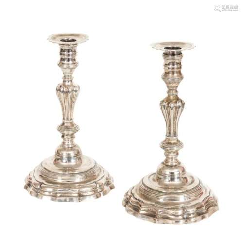 Jean-Louis III IMLIN (received master in 1746)Pair of silver candlesticks with a fretworked base and a shaft decorated with gadroonsStrasbourg stamp, one signed in full Imlin, the other with the stamp of the master goldsmith I.F.S.Period circa 1760H: 24.5 cmTotal weight: +/- 1050 grs.