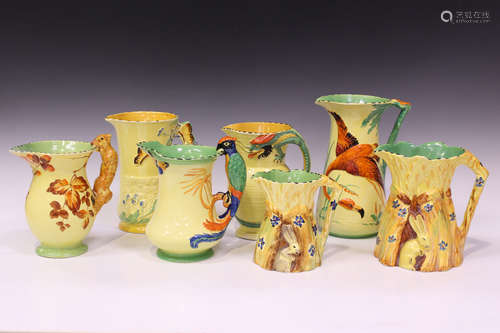 Seven Burleigh Ware naturalistic jugs, including two graduated examples each moulded as a corn stook