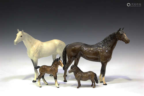 Eight Beswick horses, including a white gloss large racehorse, No. 1564, three large hunters, No.