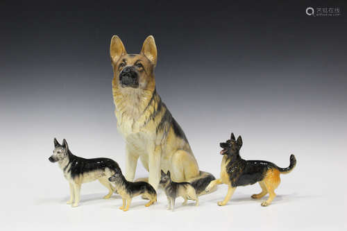 Five Beswick models of Alsatians, Nos. 969, 1762A, 1762B, 2410 and 3073, together with a group of