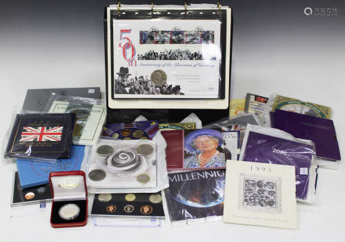 A collection of mainly Royal Mint commemorative coins and coin sets, including a Millennium ten-coin