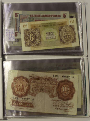 A collection of British and world banknotes, including a Bank of England five pounds note J.S.