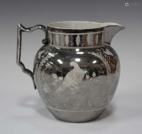 A pearlware silver lustre jug, early 19th century, decorated with birds amongst stylized foliage,