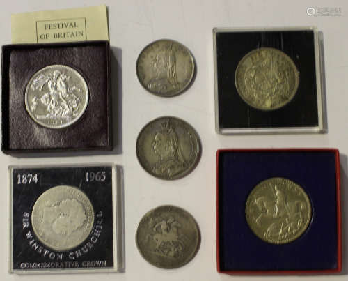 A group of British crowns, including a George III 1818, a George III 1820, a Victoria Jubilee Head