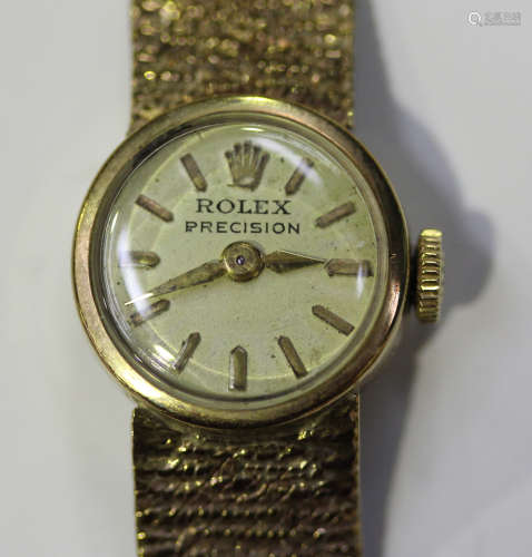 A Rolex Precision 9ct gold lady's bracelet wristwatch, the signed silvered dial with gilt baton hour