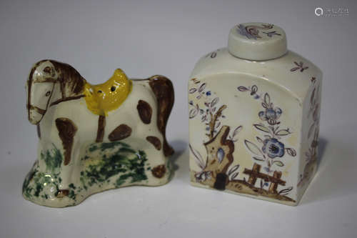 A Continental porcelain tea caddy and cover, late 18th/19th century, of shouldered rectangular form,