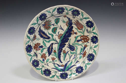 A Cantagalli Iznik circular charger, late 19th/early 20th century, boldly painted with a central saz