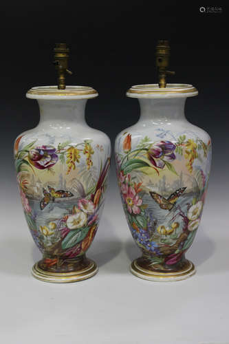 A pair of French porcelain vases, mid-19th century, each painted with a polychrome butterfly