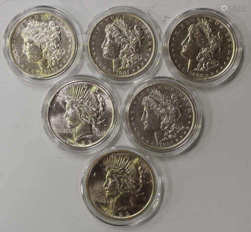 Six USA silver one dollars, comprising 1881, 1882, 1883, 1886 and two 1922.