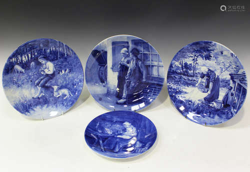 Four De Porceleyne Fles Royal Delft circular chargers or wall plates, mid-20th century, each