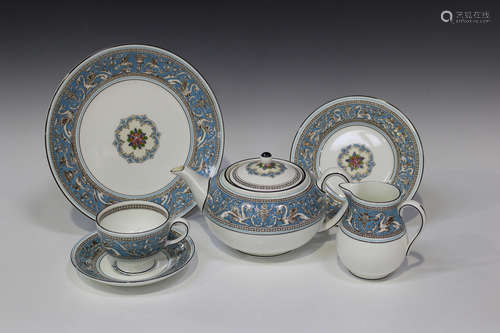 A Wedgwood blue 'Florentine' pattern part service, comprising teapot and cover, milk jug, sugar