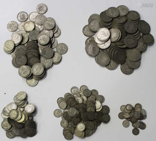 A collection of pre-1947 silver-nickel coinage, including half-crowns, florins, shillings, sixpences