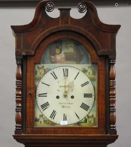 A George III inlaid oak and mahogany crossbanded longcase clock with eight day movement striking