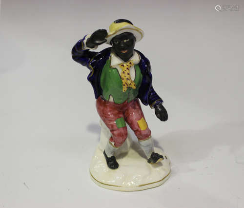 A Staffordshire porcelaneous figure, early 19th century, modelled as T.P. Rice in the role of Jim