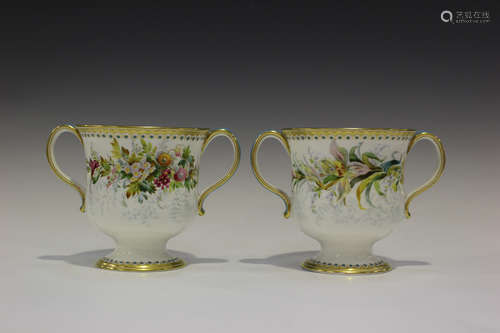 A pair of English porcelain Minton style two-handled vases, mid-19th century, the U-shaped bodies