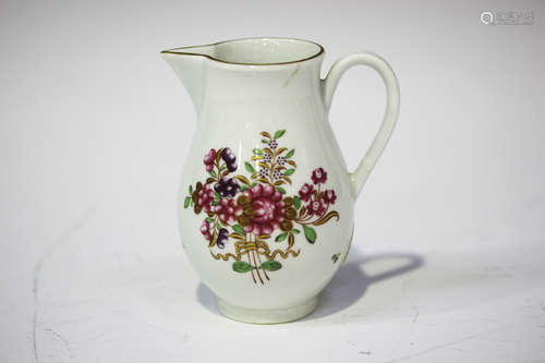 A Worcester sparrow beak cream jug, circa 1775, painted in famille rose style with a bouquet of