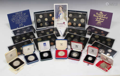 A large collection of Royal Mint year-type sets and a group of Royal Mint commemorative coins,