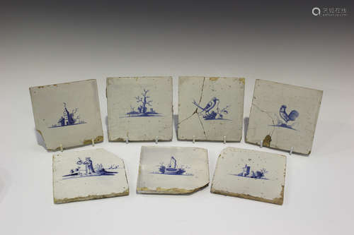 Fourteen assorted Dutch Delft tiles, 18th century, of square shape, each painted in blue with