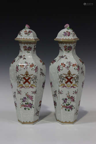 A pair of Samson Chinese famille rose style hexagonal vases and covers, early 20th century, each