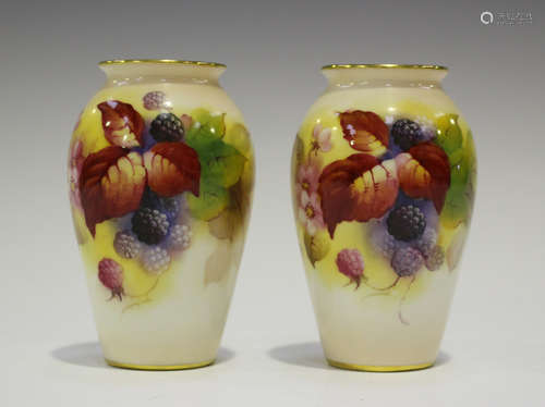 A pair of Royal Worcester vases, circa 1931 by Kitty Blake, signed, each painted with blackberries