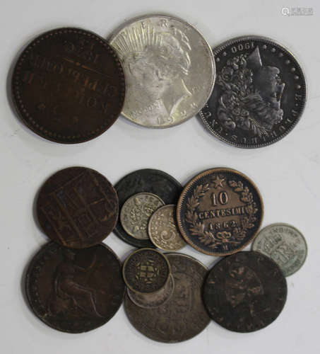 A small collection of British and world coinage, including two USA one dollars, 1900 and 1923, and a