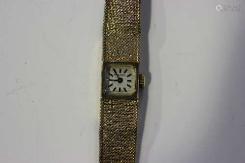 A Rotary 9ct gold lady's bracelet wristwatch with signed dial, on a mesh link bracelet with foldover