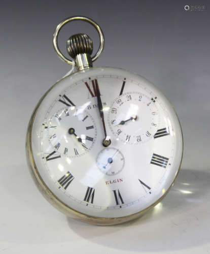 An early 20th century American oversized magnifying glass globe desk timepiece, the white enamel