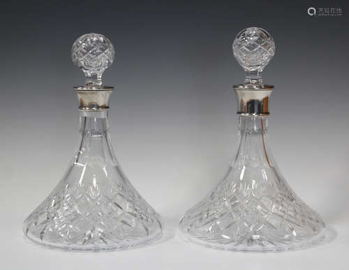 A matched pair of silver mounted cut glass ship's decanters and stoppers, Birmingham 1994 by