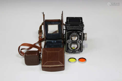 A Franke & Heidecke Rolleiflex twin lens reflex camera, serial No. '1472144', with Heidosmat 1:2.8/