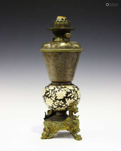 A stoneware gilt metal mounted table oil lamp, probably Doulton, late 19th century, decorated in the