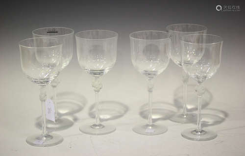 A set of six Lalique Roxane pattern clear and frosted wine glasses, each frosted stem moulded as two