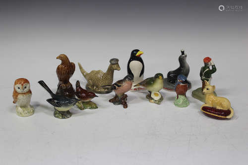 Six Beswick birds, including Kingfisher, Greenfinch and Wren, three reproduction Guinness