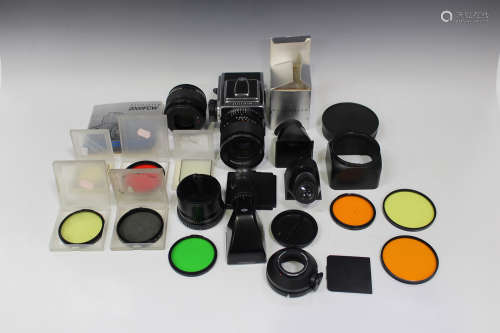 A Hasselblad 2000FC camera with Carl Zeiss planar 2/110 T * lens, together with a collection of