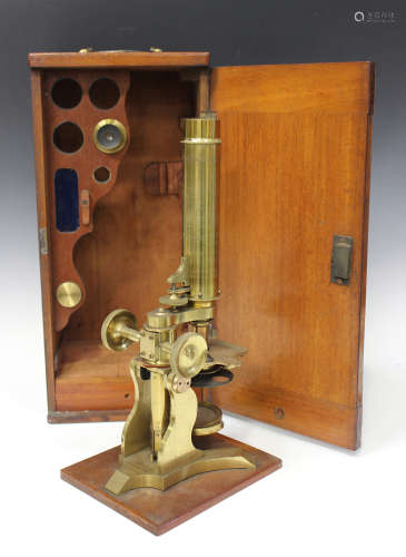 A 19th century lacquered brass monocular microscope, signed 'James How, Foster Lane London', with