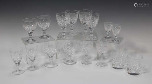 A mixed group of cut drinking glasses, 20th century, including a part suite of Stuart with cross and