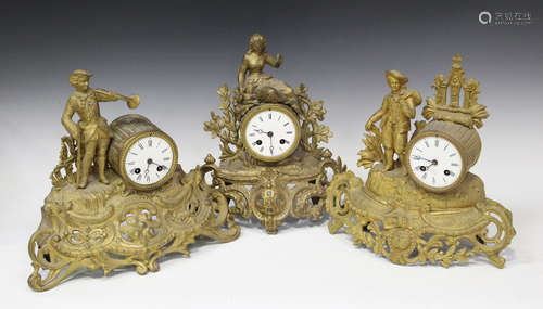 A late 19th century gilt spelter mantel clock with eight day movement striking on a bell via an