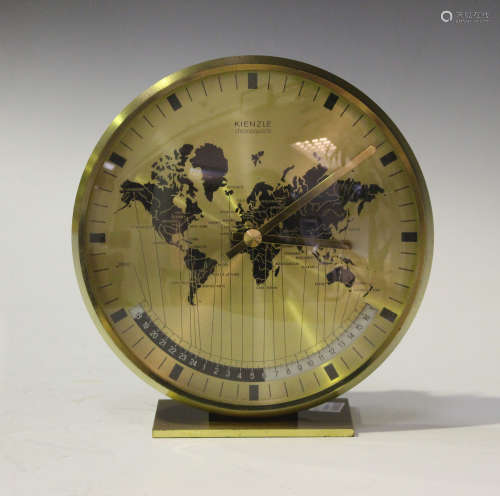A mid-20th century Kienzle Chronoquartz brass cased world time zone table clock, the signed gilt
