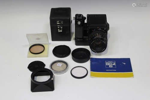 A Zenza Bronica SQ-AM camera with Zenzanon-PS 1:4 f=150mm lens, No. 15702534, and various