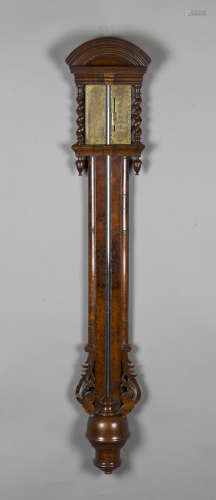 A Queen Anne style walnut veneered stick barometer, the unsigned brass dial with engraved detail and
