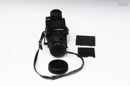 A Zenza Bronica SQ-A camera with viewfinder and Zenzanon-PS 1:4 f=65mm lens, No. 6602252.Buyer’s