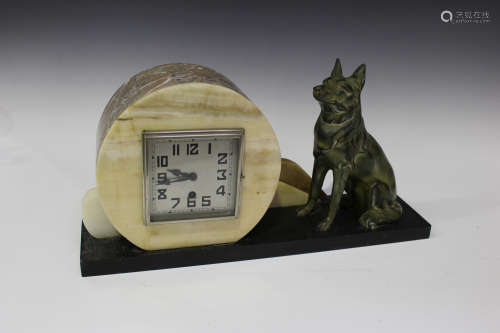 A French Art Deco spelter marble and onyx mantel clock, the silvered square dial with Arabic
