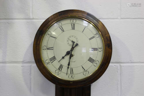 A 20th century Dutch walnut wall timepiece, the circular dial with Roman and Arabic numerals and