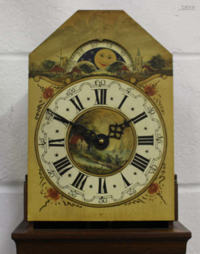 A 20th century Dutch walnut wall timepiece, the painted dial with rolling moon to arch and inscribed